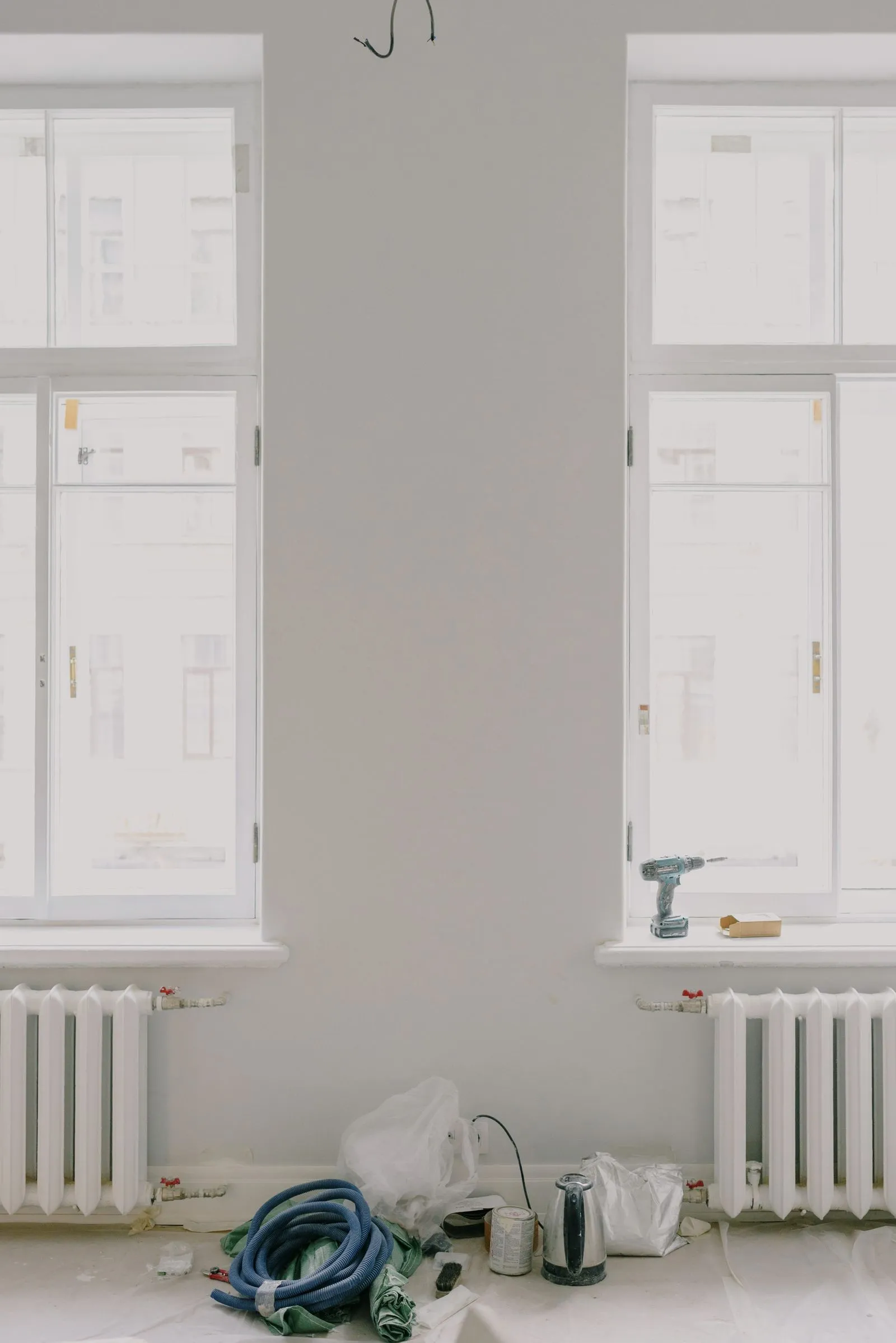 Bright bathroom-adjacent room with clean glass and a light frame